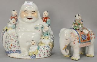 Appraisal: Two Oriental porcelain figural pieces including Budha with boys and