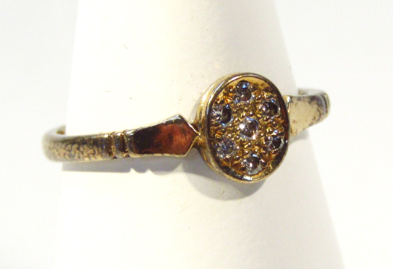 Appraisal: A ladies dress ring the oval head set with small