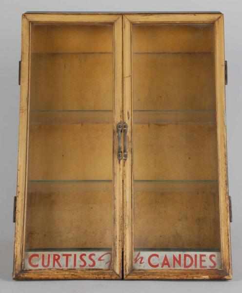 Appraisal: Wooden Curtiss Candies Slant Front Display Case Description Some wear