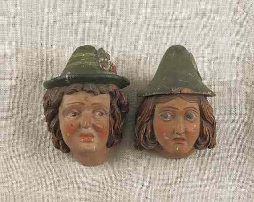 Appraisal: Pair of painted and carved pine wall plaques early th