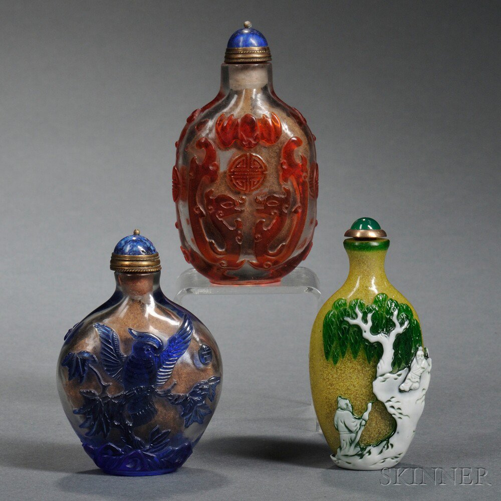 Appraisal: Three Peking Glass Snuff Bottles China one with red overlay