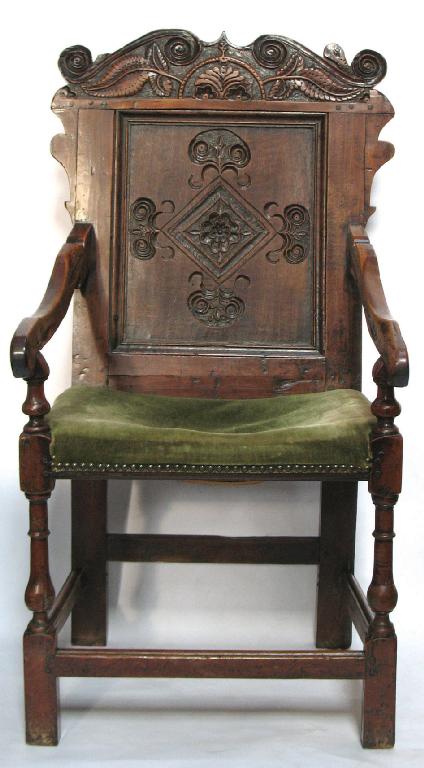 Appraisal: A LATE TH CENTURY FRUITWOOD AND OAK ARMCHAIR the back