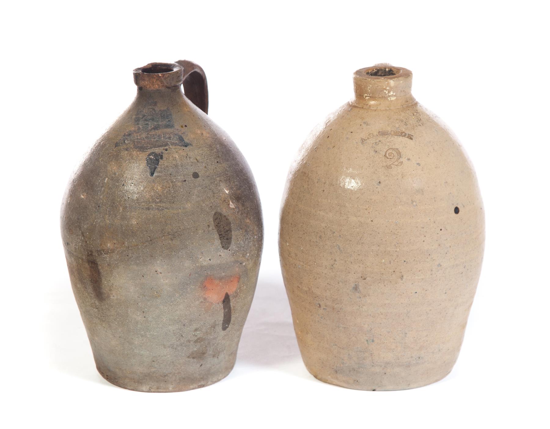 Appraisal: TWO OHIO STONEWARE JUGS Two gallon ovoid jugs with impressed