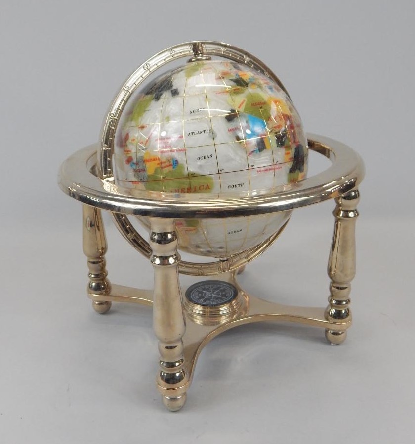 Appraisal: An Osbourne Clark Limited gemstone globe on plated stand