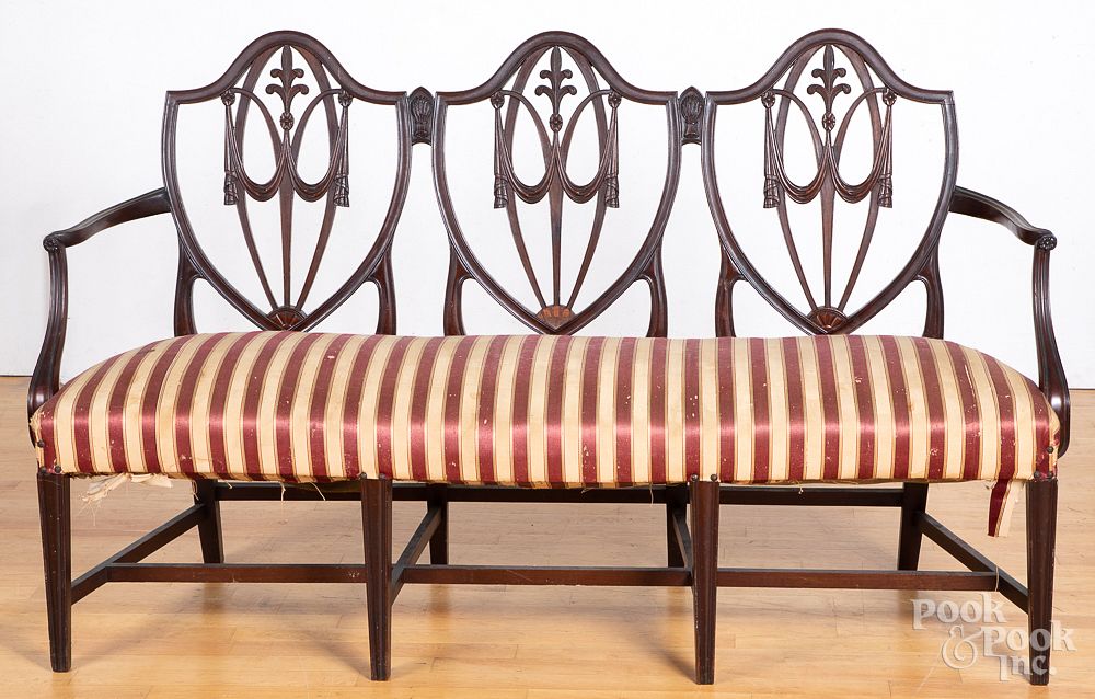 Appraisal: Federal style carved mahogany settee Federal style carved mahogany triple