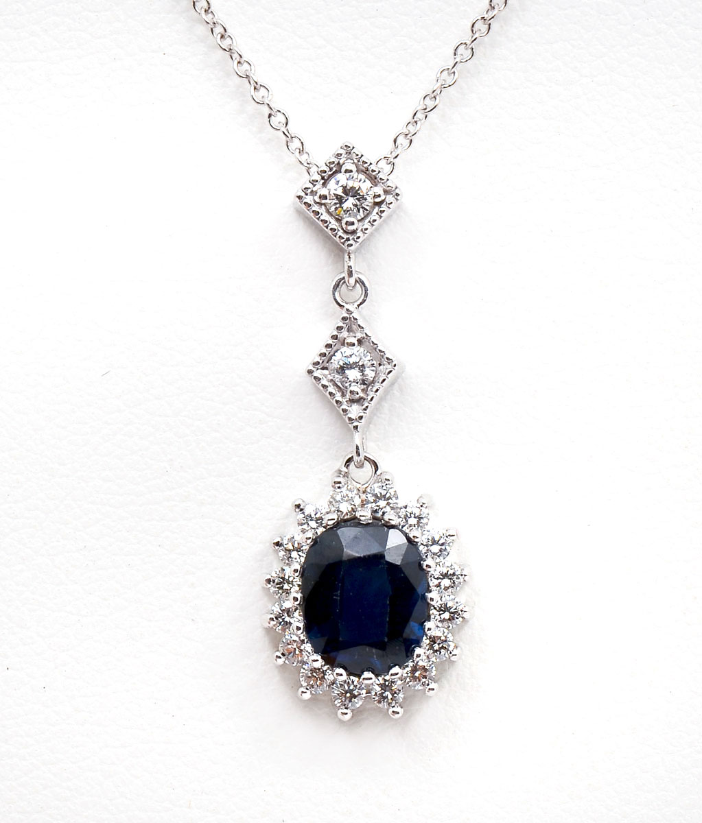 Appraisal: K DIAMOND SAPPHIRE DROP PENDANT NECKLACE CT oval mixed cut