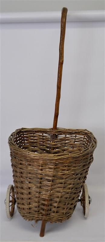 Appraisal: ANTIQUE EUROPEAN MARKET ROLLING BASKET Antique European Wicker Market Basket