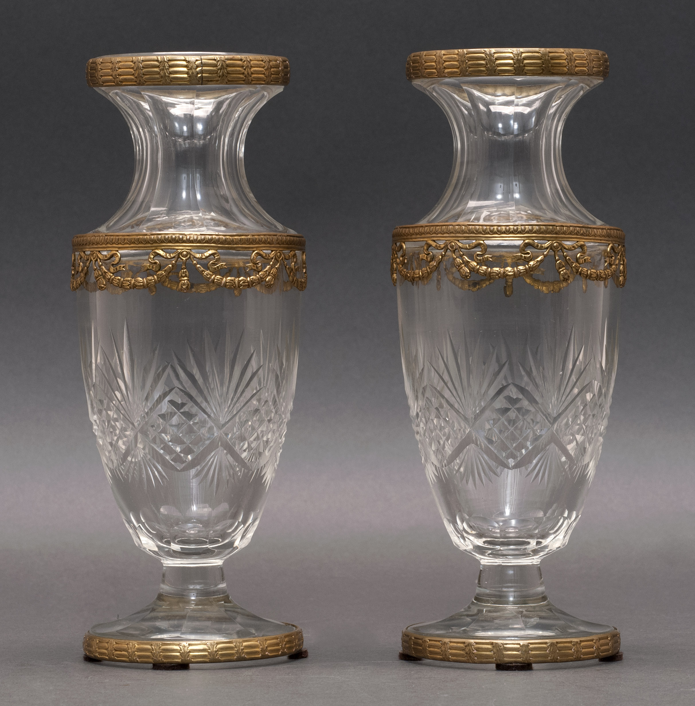 Appraisal: PAIR OF ORMOLU-MOUNTED VENETIAN CLEAR GLASS VASES th CenturyEach balustroid