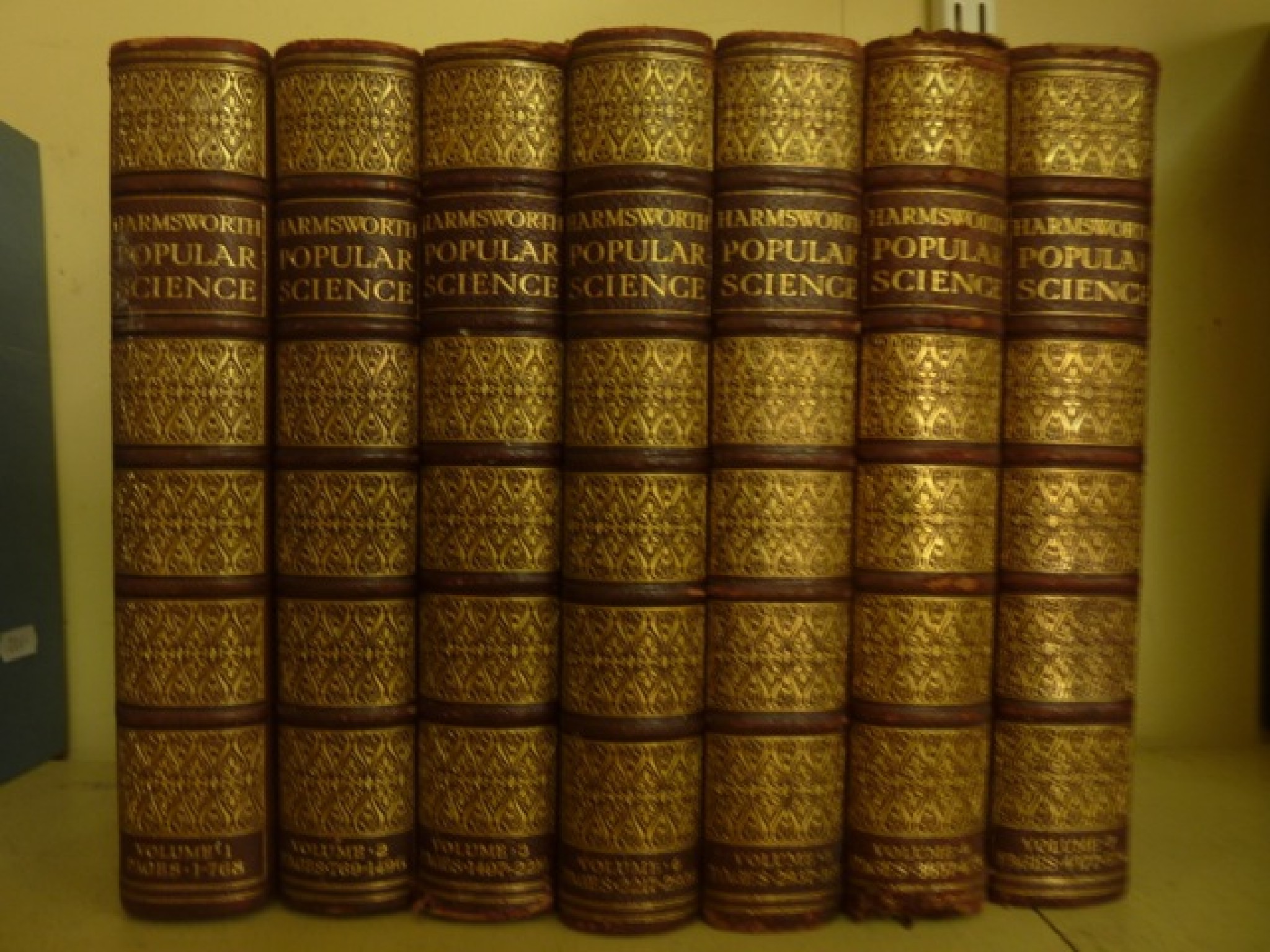 Appraisal: Harmsworth Popular Science volumes maroon and gilt leather spine