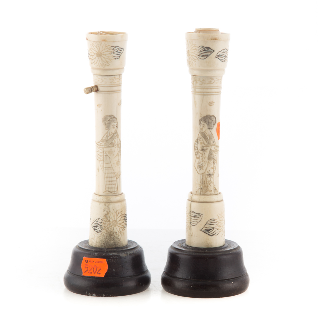 Appraisal: Pair of Chinese etched and carved candlesticks on wood bases