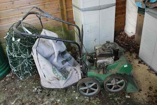 Appraisal: A GREEN PAINTED ESTATE SELF PROPELLED GARDEN VACUUM CLEANER with