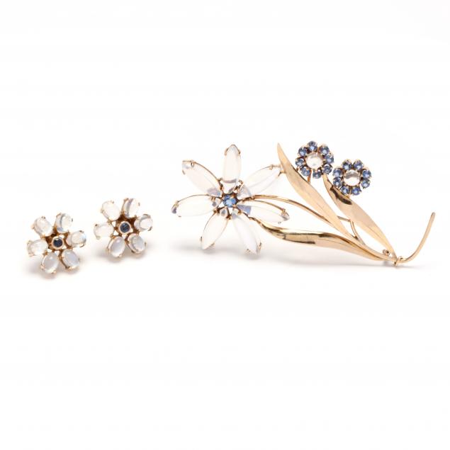 Appraisal: RETRO GOLD AND GEM-SET FLOWER MOTIF BROOCH AND EARRINGS To