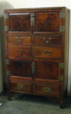 Appraisal: Chinese Elmwood dresser with six drawers and four doors natural