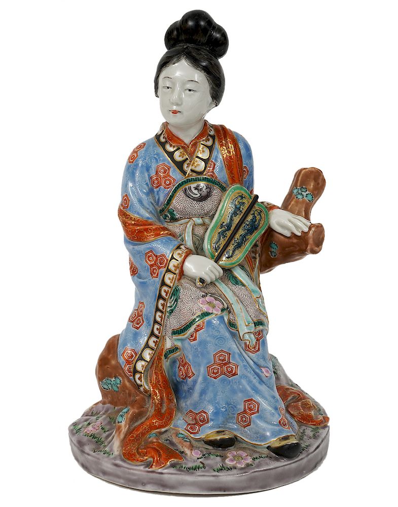 Appraisal: Chinese Porcelain Seated Woman w Fan Chinese porcelain figure of