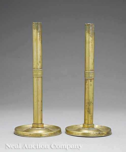 Appraisal: A Pair of Cornelius Co Brass Candlesticks c cylindrical shaft