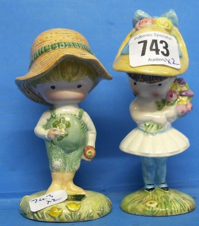 Appraisal: Beswick Figures Anglund Boy Anglund Girl With Flowers