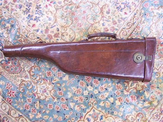 Appraisal: Hard leather leg-of-mutton gun case standard specifications with carrying handle