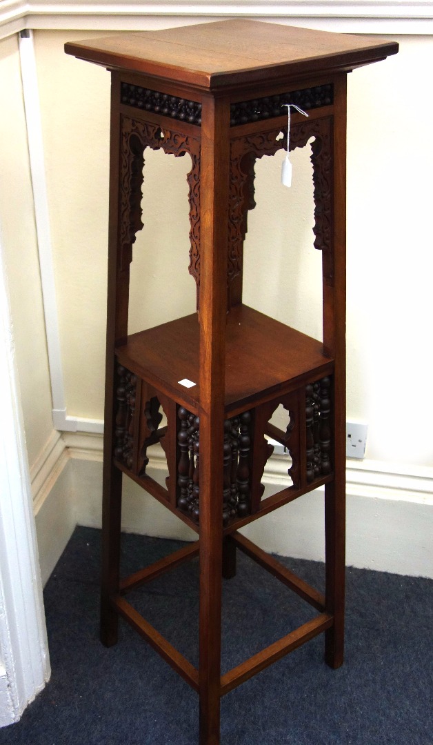 Appraisal: Attributed to Liberty Co a walnut two tier plant stand