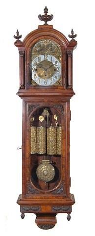 Appraisal: A BURR WALNUT CASED WALL CLOCK the arched hood with