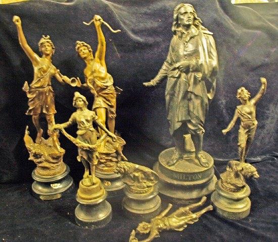 Appraisal: A spelter figure of Milton standing by a discarded book