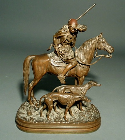 Appraisal: Dubucand Alfred French - bronze of a horseman and wolfhounds