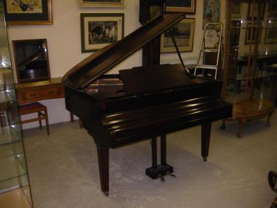 Appraisal: A BABY GRAND PIANO by Marshall Rose in mahogany case