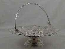 Appraisal: A hallmarked silver swing handle basket approx cm diameter Sheffield