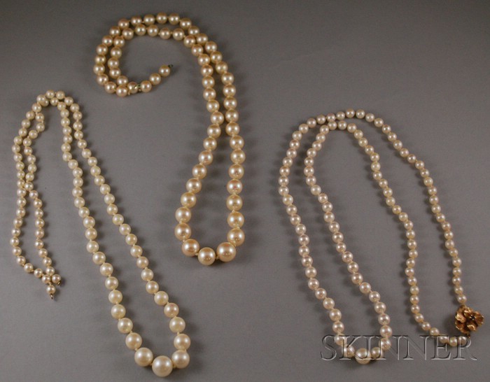 Appraisal: Three Graduated Strands of Cultured Pearls one with a kt