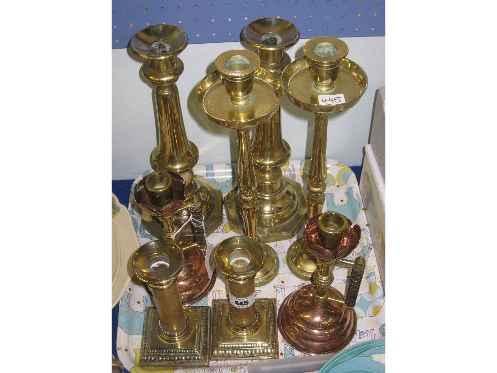 Appraisal: Lot comprising three pairs of brass and copper candl