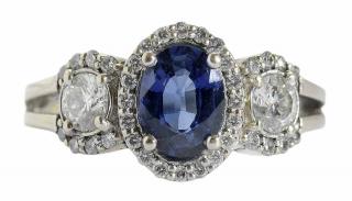 Appraisal: kt Sapphire and Diamond Ring with central oval faceted blue