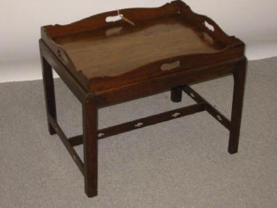 Appraisal: A MAHOGANY BUTLER'S TRAY ON STAND c the oblong tray