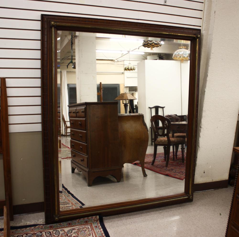 Appraisal: LARGE BRASS AND MAHOGANY FRAMED WALL MIRROR American th century