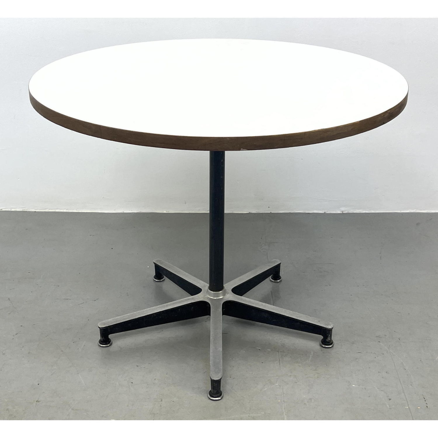 Appraisal: Herman Miller Eames White Laminate and Walnut Edge Dining Table