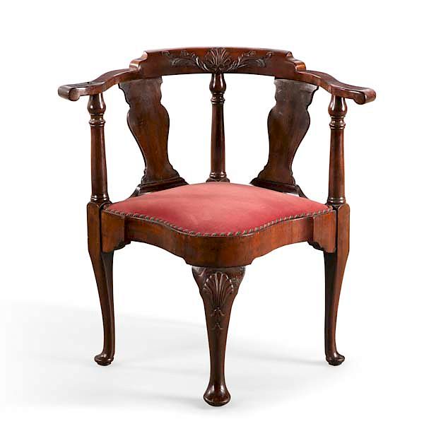 Appraisal: A George II carved mahogany corner armchair A George II