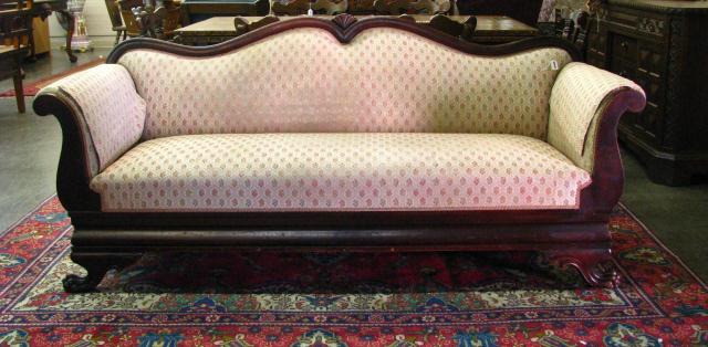 Appraisal: Antique Victorian sofa transitional Empire Style with paw carved front