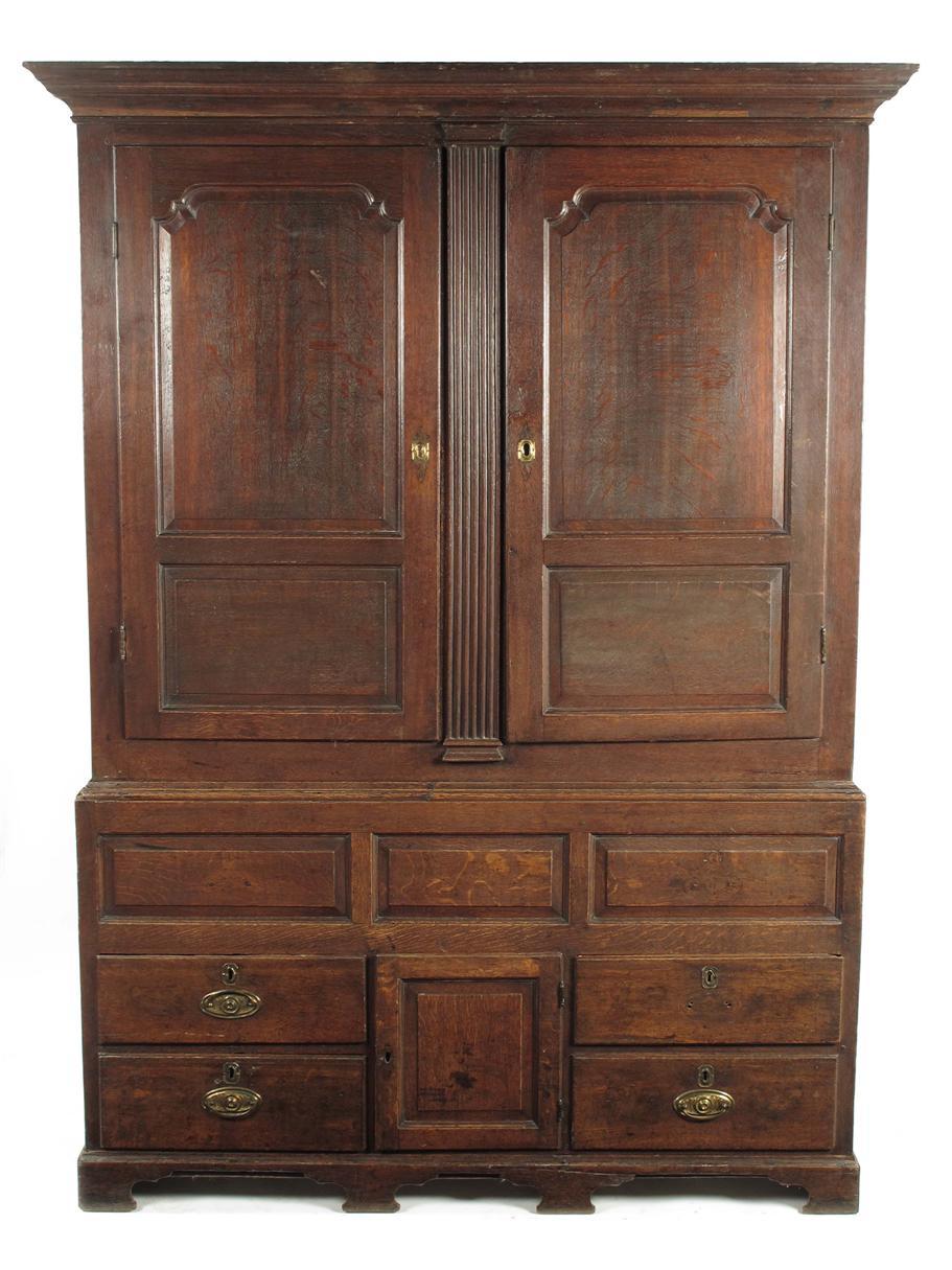 Appraisal: A mid th century oak press cupboard