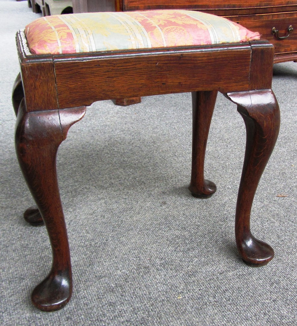 Appraisal: A small th century oak rectangular stool on pad feet