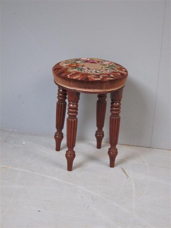 Appraisal: th century mahogany stool with needlework seat raised on four