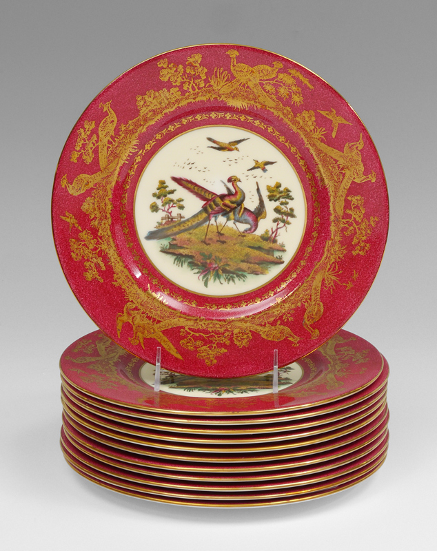 Appraisal: WEDGWOOD PHOENIX SERVICE PLATES Ornate fuscia trim with gilt bird