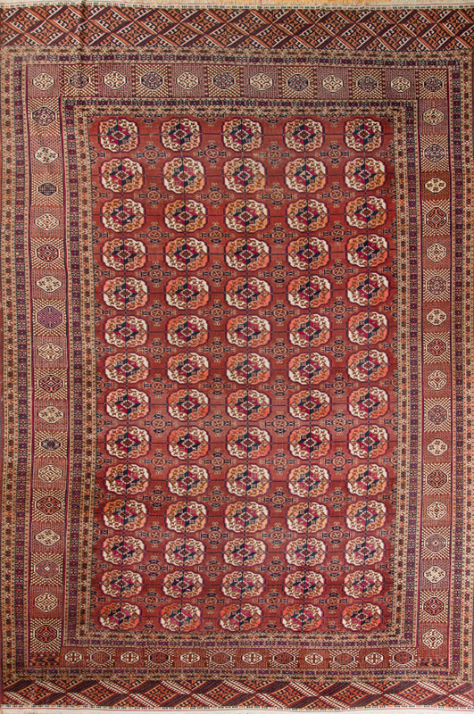 Appraisal: TEKKE TURCOMAN CARPET The burgundy field worked with five rows