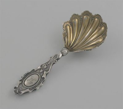 Appraisal: A Victorian caddy spoon with shell gilt bowl shaped scrolling