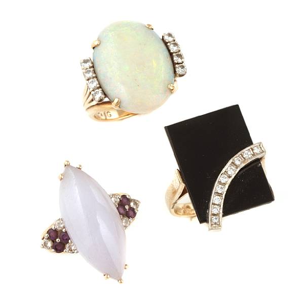 Appraisal: A collection of three gem-set diamond and gold rings one