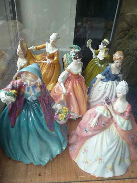 Appraisal: EIGHT ROYAL DOULTON FIGURINES consisting of HN HN HN HN