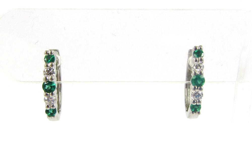 Appraisal: PAIR OF DIAMOND EMERALD AND EIGHTEEN KARAT GOLD EARRINGS each