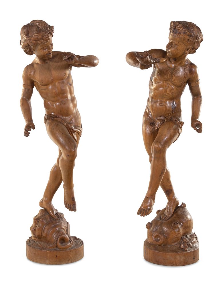 Appraisal: A Pair of Continental Carved Wood Figures of Dancing Putti