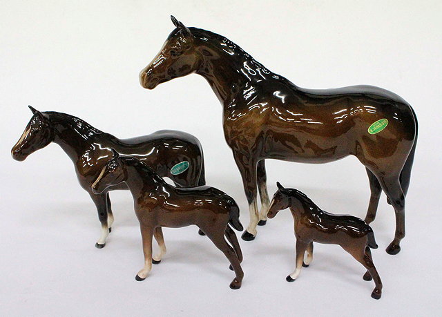 Appraisal: A SET OF FOUR 'S 'S GRADUATED BESWICK HORSES