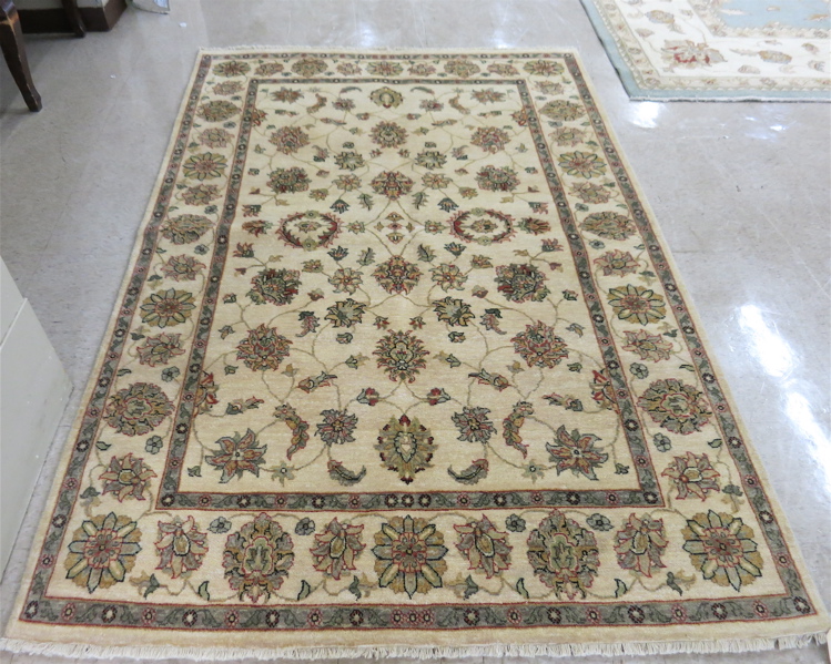 Appraisal: HAND KNOTTED ORIENTAL CARPET Indo-Persian overall Isfahan floral design on