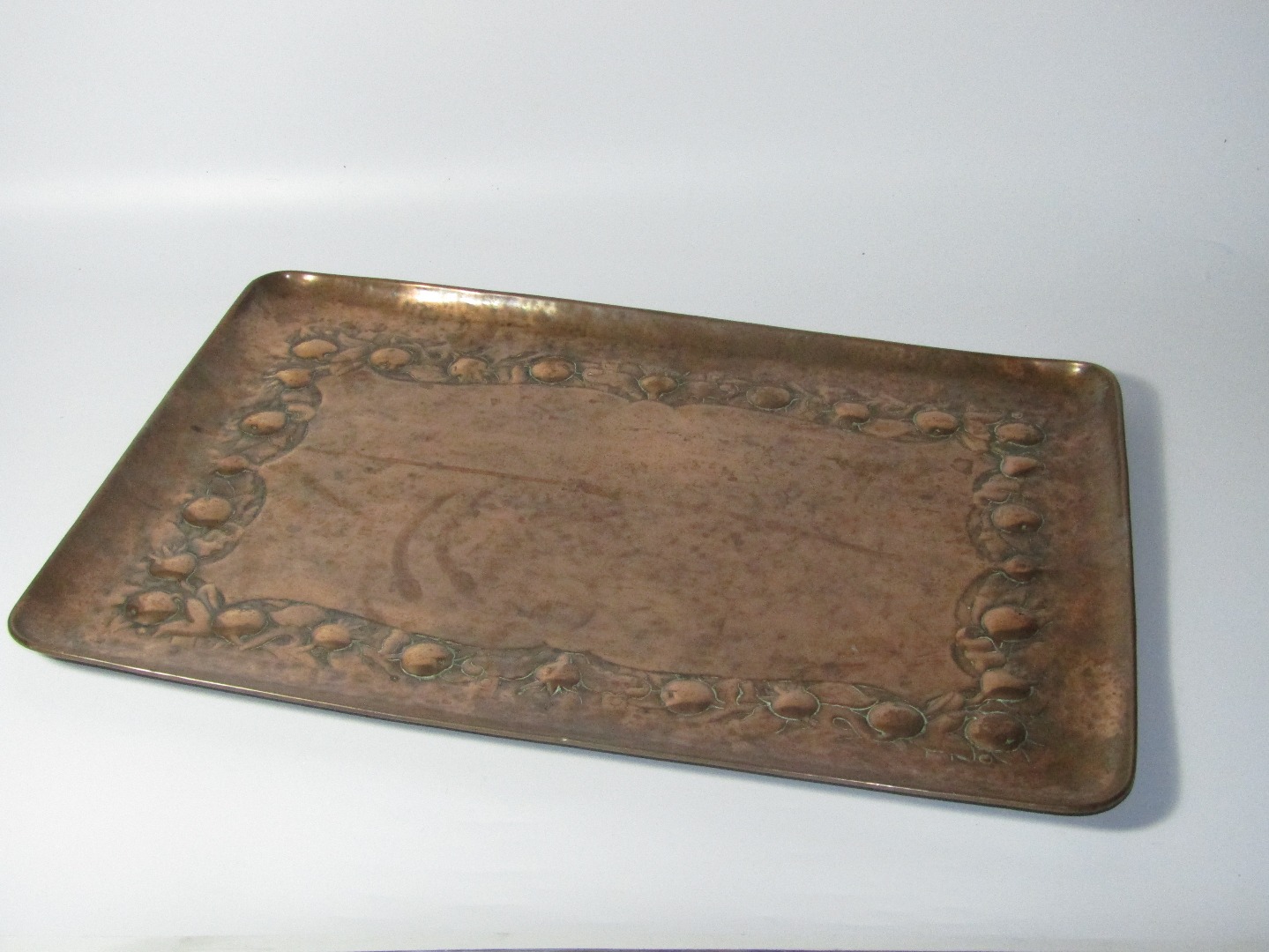 Appraisal: A Newlyn Arts Crafts copper rectangular tray hammered and embossed