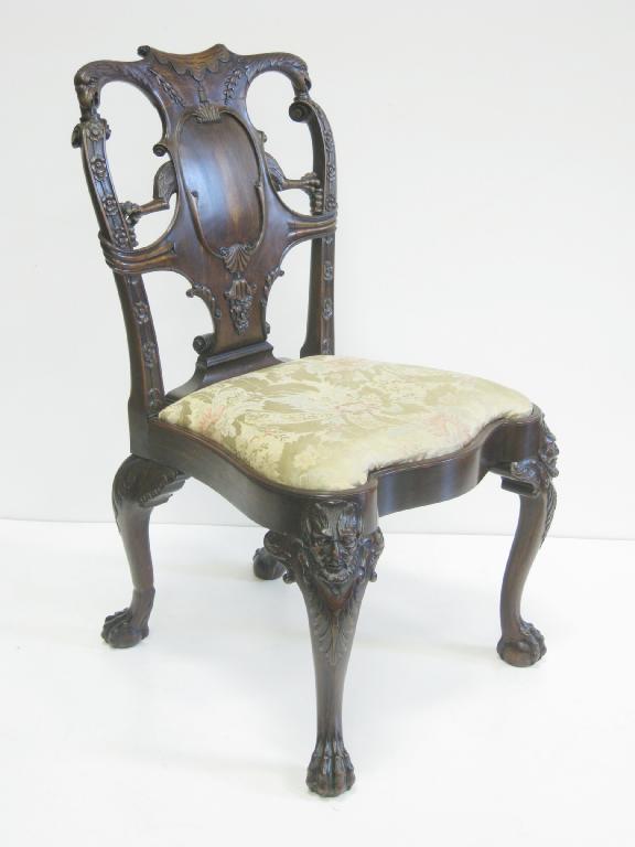 Appraisal: A Cuban mahogany Chippendale style Chair finely carved with griffin