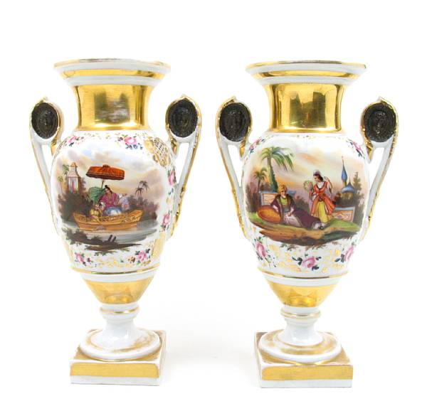 Appraisal: A pair of Paris porcelain painted urns height in